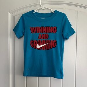 Nike Kids Teal 'Winning and Grinning' Tee
